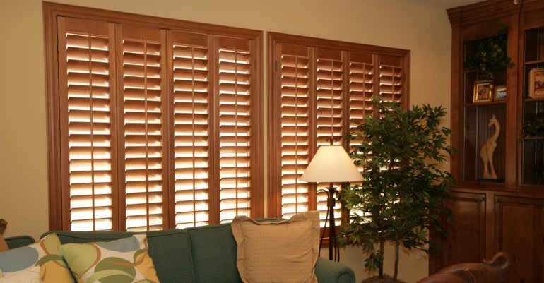 Hardwood shutters in Orlando living room.